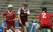 29 May 2005; Brendan Kerins, Galway, in action against Joanne O'Callaghan, left, and Jennifer Browne, Cork. National Camogie League, Division 1 Final, Galway v Cork, Semple Stadium, Thurles, Co. Tipperary. Picture credit; Brendan Moran / SPORTSFILE
