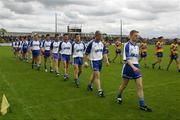 29 May 2005; The Waterford and Clare teams during the pre-match parade. Bank of Ireland Munster Senior Football Championship, Clare v Waterford, Cusack Park, Ennis, Co. Clare. Picture credit; Kieran Clancy / SPORTSFILE