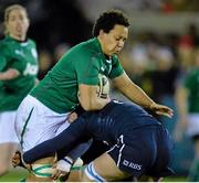 31 January 2014; Sophie Spence, Ireland, is tackled by Sarah Quick, left, and Gillian Inglis, hidden, Scotland. Women's Six Nations Rugby Championship, Ireland v Scotland, Ashbourne RFC, Ashbourne, Co. Meath. Picture credit: Ramsey Cardy / SPORTSFILE