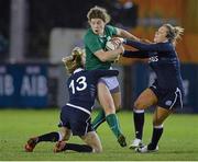 31 January 2014; Jenny Murphy, Ireland, is tackled by Annabel Sergeant, left, and Gillian Inglis, Scotland. Women's Six Nations Rugby Championship, Ireland v Scotland, Ashbourne RFC, Ashbourne, Co. Meath. Picture credit: Ramsey Cardy / SPORTSFILE