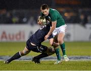 31 January 2014; Ros Byrne, Ireland, is tackled by Glen Young, Scotland. U20 Six Nations Rugby Championship, Ireland v Scotland, Dubarry Park, Athlone, Co. Westmeath. Picture credit: David Maher / SPORTSFILE