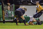 31 January 2014; Stacey Lee Kennedy, Ireland, dives over to score a try despite the defensive efforts of Annabel Sergeant, Scotland. Women's Six Nations Rugby Championship, Ireland v Scotland, Ashbourne RFC, Ashbourne, Co. Meath. Picture credit: Ramsey Cardy / SPORTSFILE