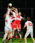 1 February 2014; James Kielt, Mark Lynch and Fergal Doherty, Derry, in action against Peter Harte, Colm Cavanagh and Conan Grugan, Tyrone. Allianz Football League Division 1 Round 1, Derry v Tyrone, Celtic Park, Derry. Picture credit: Oliver McVeigh / SPORTSFILE