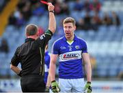 2 February 2014; Denis Booth, Laois, is shown the red card by referee Conor Lane after his late challenge on Mark McHugh, Donegal. Allianz Football League, Division 2, Round 1, Laois v Donegal, O'Moore Park, Portlaoise, Co. Laois. Picture credit: Barry Cregg / SPORTSFILE