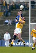 4 June 2005; Pierce McKenna, Cavan, in action against Paddy Logan, Antrim. Bank of Ireland Ulster Senior Football Championship Replay, Antrim v Cavan, Casement Park, Belfast. Picture credit; Pat Murphy / SPORTSFILE