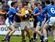 4 June 2005; Ciaran Close, Antrim, in action against, from left, Martin Cahill, Dermot McCabe, Keith Fannin and Peter Reilly, Cavan. Bank of Ireland Ulster Senior Football Championship Replay, Antrim v Cavan, Casement Park, Belfast. Picture credit; Pat Murphy / SPORTSFILE