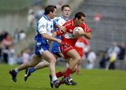 5 June 2005; Sean Martin Lockhart, Derry, in action against Monaghan's James Coyle, left, and Shane McManus. Bank of Ireland Ulster Senior Football Championship, Monaghan v Derry, St. Tighernach's Park, Clones, Co. Monaghan. Picture credit; Damien Eagers / SPORTSFILE