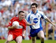 5 June 2005; Paddy Bradley, Derry, in action against Gary McQuaid, Monaghan. Bank of Ireland Ulster Senior Football Championship, Monaghan v Derry, St. Tighernach's Park, Clones, Co. Monaghan. Picture credit; Damien Eagers / SPORTSFILE