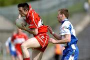 5 June 2005; Eoin Bradley, Derry, in action against Colm Flanagan, Monaghan. Bank of Ireland Ulster Senior Football Championship, Monaghan v Derry, St. Tighernach's Park, Clones, Co. Monaghan. Picture credit; Damien Eagers / SPORTSFILE