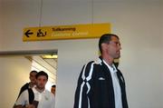 6 June 2005; Roy Keane, Republic of Ireland, with team-mates Andy Reid and John O'Shea, left, on their arrival at Vagar Airport, Faroe Islands, in advance of the Faroe Islands v Republic of Ireland game. Vagar Airport, Faroe Islands. Picture credit; David Maher / SPORTSFILE