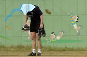 8 June 2005; Second row Leo Cullen cools down with a wet towel at the end of training. Ireland rugby squad training, Kintetsu Hanazono rugby ground, Osaka, Japan. Picture credit; Brendan Moran / SPORTSFILE