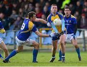 2 February 2014; Donie Shine, Roscommon, in action against Michael Brady, Longford. Allianz Football League, Division 3, Round 1, Longford v Roscommon, Glennon Brothers Pearse Park, Longford. Picture credit: Oliver McVeigh / SPORTSFILE