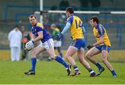 2 February 2014; Peter Brady, Longford, in action against Donie Shine and Mark McNally, right, Roscommon. Allianz Football League, Division 3, Round 1, Longford v Roscommon, Glennon Brothers Pearse Park, Longford. Picture credit: Oliver McVeigh / SPORTSFILE