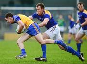 2 February 2014; Ciaran Daly, Roscommon, in action against Michael Brady, Longford. Allianz Football League, Division 3, Round 1, Longford v Roscommon, Glennon Brothers Pearse Park, Longford. Picture credit: Oliver McVeigh / SPORTSFILE
