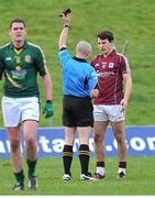 2 February 2014; Referee Martin Higgins issues Sean Armstrong, Galway, with a black card. Allianz Football League, Division 2, Round 1, Meath v Galway, Páirc Táilteann, Navan, Co. Meath. Picture credit: Ray Ryan / SPORTSFILE