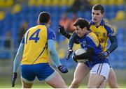 2 February 2014; Francis McGee, Longford, in action against Donal Shine, left, and Cathal Shine, Roscommon. Allianz Football League, Division 3, Round 1, Longford v Roscommon, Glennon Brothers Pearse Park, Longford. Picture credit: Oliver McVeigh / SPORTSFILE