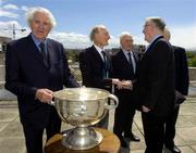 23 May 2005; Surviving members of the 1947 All-Ireland Football Final John Wilson, Cavan, with the Sam Maguire Cup, with Teddy Sullivan, Kerry, Mick Finnucane, Kerry, Simon Deignan, Cavan, and Tony Tighe, Cavan, in conversation at the inaugural Lucozade Sport sponsored Association of Sports Journalists in Ireland Sporting Legends lunch to honour the surviving members of the 1947 All-Ireland Football Final played in the Polo Grounds, New York. Jury's Hotel, Ballsbridge, Dublin. Picture credit; Ray McManus / SPORTSFILE