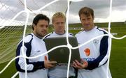 3 June 2005; Pictured are Irish soccer stars Andy Reid, Damien Duff, and Kenny Cunningham reading e wishes from the Irish fans using a wireless hotspot ahead of tomorrow's crunch world cup qualifier with Israel at Lansdowne Road. Tomorrow Lansdowne Road will become eircom's 300th wireless hotpspot. Malahide FC, Malahide, Dublin. Picture credit; Damien Eagers / SPORTSFILE