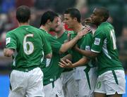 8 June 2005; The Republic of Ireland's Ian Harte, second from right, celebrates with team-mates, left to right, Roy Keane, Andy Reid, and Clinton Morrison, after scoring his sides first goal from the penalty spot. FIFA 2006 World Cup Qualifier, Faroe Islands v Republic of Ireland, Torsvollur Stadium, Torshavn, Faroe Islands. Picture credit; David Maher / SPORTSFILE