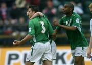 8 June 2005; Ian Harte, Republic of Ireland, celebrates after scoring his side's first goal with team-mate Stephen Elliott and Clinton Morrison, right. FIFA 2006 World Cup Qualifier, Faroe Islands v Republic of Ireland, Torsvollur Stadium, Torshavn, Faroe Islands. Picture credit; David Maher / SPORTSFILE