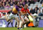 5 June 2005; Brian Carberry, Carlow, in action against Paraic Curtis, Wexford. Bank of Ireland Leinster Senior Football Championship, Carlow v Wexford, Croke Park, Dublin. Picture credit; David Maher / SPORTSFILE