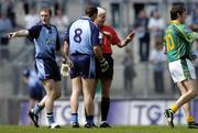 5 June 2005; Referee John Bannon prepares to issue Dublin's Ciaran Whealan a yellow card in the first minute of the game. Bank of Ireland Leinster Senior Football Championship, Dublin v Meath, Croke Park, Dublin. Picture credit; David Maher / SPORTSFILE