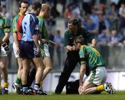 5 June 2005; Meath's Nigel Crawford is attended to during the first minute of the match. Bank of Ireland Leinster Senior Football Championship, Dublin v Meath, Croke Park, Dublin. Picture credit; David Maher / SPORTSFILE