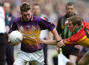 5 June 2005; PJ Banville, Wexford, in action against Paul Cashin, Carlow. Bank of Ireland Leinster Senior Football Championship, Carlow v Wexford, Croke Park, Dublin. Picture credit; David Maher / SPORTSFILE