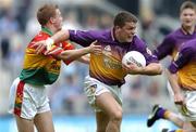 5 June 2005; Jim D'Arcy, Wexford, in action against Paul Kelly, Carlow. Bank of Ireland Leinster Senior Football Championship, Carlow v Wexford, Croke Park, Dublin. Picture credit; David Maher / SPORTSFILE