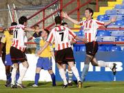 10 June 2005; Clive Delaney, far right, Derry City, celebrates after scoring his sides second goal with team-mates left to right, Killian Brennan and Ruardhi Higgins. FAI Carlsberg Cup 2nd Round, Shelbourne v Derry City, Tolka Park, Dublin. Picture credit; David Maher / SPORTSFILE
