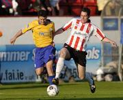 10 June 2005; Wesley Hoolahan, Shelbourne, in action against Ruardhi Higgins, Derry City. FAI Carlsberg Cup 2nd Round, Shelbourne v Derry City, Tolka Park, Dublin. Picture credit; David Maher / SPORTSFILE