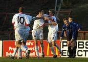 10 June 2005; John Paul Kelly, Bohemians, celebrates with team-mates Steven Ward, 11, Tony Grant, 10, and Kevin Hunt, hidden, after scoring his sides first goal. FAI Carlsberg Cup 2nd Round, Bohemians v Athlone Town, Dalymount Park, Dublin. Picture credit; Pat Murphy / SPORTSFILE