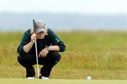 11 June 2005; Ireland's Claire Coughlan lines up a putt on the 14th green on her way to winning her semi-final against Holland's Christel Boeljon during the Ladies British Amateur Open. Littlestone, Ken England. Picture credit; SPORTSFILE *** Local Caption *** .