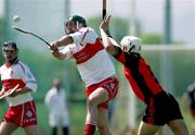 11 June 2005; Ruari Convery, Derry, is tackled by Gabriel Clarke, Down. Christy Ring cup, Group 2A, Round 1, Derry v Down, Lavey, Co. Derry. Picture credit; Oliver McVeigh / SPORTSFILE