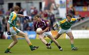 12 June 2005; Michael Donnellan, Galway, in action against Colin Regan, right, and Gary McCloskey, Leitrim. Bank of Ireland Connacht Senior Football Championship Semi-Final, Galway v Leitrim, Pearse Stadium, Galway. Picture credit; Ray McManus / SPORTSFILE