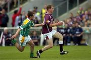 12 June 2005; Michael Donnellan, Galway, is tackled by Barry McWeeney, Leitrim. Bank of Ireland Connacht Senior Football Championship Semi-Final, Galway v Leitrim, Pearse Stadium, Galway. Picture credit; Ray McManus / SPORTSFILE