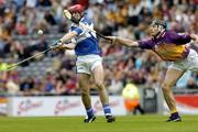 12 June 2005; James Young, Laois, in action against Declan Ruth, Wexford. Guinness Leinster Senior Hurling Championship Semi-Final, Wexford v Laois, Croke Park, Dublin. Picture credit; Matt Browne / SPORTSFILE