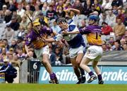 12 June 2005; Darren Rooney, Laois, in action against Rory Jacob, left, and Eoin Quigley, Wexford. Guinness Leinster Senior Hurling Championship Semi-Final, Wexford v Laois, Croke Park, Dublin. Picture credit; Pat Murphy / SPORTSFILE