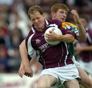 12 June 2005; Michael Donnellan, Galway, in action against Gary McCloskey, Leitrim. Bank of Ireland Connacht Senior Football Championship Semi-Final, Galway v Leitrim, Pearse Stadium, Galway. Picture credit; Ray McManus / SPORTSFILE