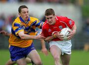 12 June 2005; Fintan Gould, Cork, in action against Kevin Dilleen, Clare. Bank of Ireland Munster Senior Football Championship Semi-Final, Clare v Cork, Cusack Park, Ennis, Co. Clare. Picture credit; Kieran Clancy / SPORTSFILE