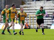 12 June 2005; Donegal's Brian Roper and Barry Monaghan, centre, react after Referee Joe McQuillan had shown the red card to team-mate Kevin Cassidy, left. Bank of Ireland Ulster Senior Football Championship Semi-Final, Donegal v Armagh, St. Tighernach's Park, Clones, Co. Monaghan. Picture credit; Damien Eagers / SPORTSFILE