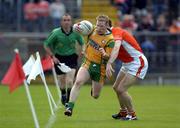 12 June 2005; Brian Roper, Donegal, in action against Paul McGrane, Armagh. Bank of Ireland Ulster Senior Football Championship Semi-Final, Donegal v Armagh, St. Tighernach's Park, Clones, Co. Monaghan. Picture credit; Damien Eagers / SPORTSFILE