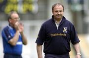 12 June 2005; Seamus Murphy, Wexford manager, walks past Laois manager Paudie Butler, left, during the final moments of the game. Guinness Leinster Senior Hurling Championship Semi-Final, Wexford v Laois, Croke Park, Dublin. Picture credit; Pat Murphy / SPORTSFILE