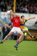 12 June 2005; Niall Geary, Cork, in action against Rory Donnelly, Clare. Bank of Ireland Munster Senior Football Championship Semi-Final, Clare v Cork, Cusack Park, Ennis, Co. Clare. Picture credit; Kieran Clancy / SPORTSFILE