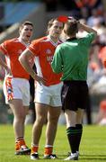 12 June 2005; Referee Joe McQuillan issues the red card to Armagh's Paddy McKeever. Bank of Ireland Ulster Senior Football Championship Semi-Final, Donegal v Armagh, St. Tighernach's Park, Clones, Co. Monaghan. Picture credit; Damien Eagers / SPORTSFILE