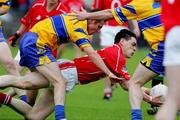 12 June 2005; Michael Cronin, Cork, in action against Alan Clohessy, Clare. Bank of Ireland Munster Senior Football Championship Semi-Final, Clare v Cork, Cusack Park, Ennis, Co. Clare. Picture credit; Kieran Clancy / SPORTSFILE