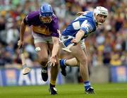 12 June 2005; David O'Connor, Wexford, in action against Liam Tynan, Laois. Guinness Leinster Senior Hurling Championship Semi-Final, Wexford v Laois, Croke Park, Dublin. Picture credit; David Levingstone / SPORTSFILE