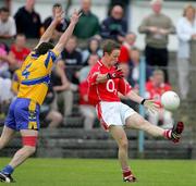 12 June 2005; John Hayes, Cork, in action against Mark O'Connell, Clare. Bank of Ireland Munster Senior Football Championship Semi-Final, Clare v Cork, Cusack Park, Ennis, Co. Clare. Picture credit; Kieran Clancy / SPORTSFILE