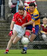 12 June 2005; John Hayes, Cork, in action against Mark O'Connell, Clare. Bank of Ireland Munster Senior Football Championship Semi-Final, Clare v Cork, Cusack Park, Ennis, Co. Clare. Picture credit; Kieran Clancy / SPORTSFILE