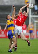 12 June 2005; Michael Cronin, Cork, in action against  Padraig Gallagher, Clare. Bank of Ireland Munster Senior Football Championship Semi-Final, Clare v Cork, Cusack Park, Ennis, Co. Clare. Picture credit; Kieran Clancy / SPORTSFILE